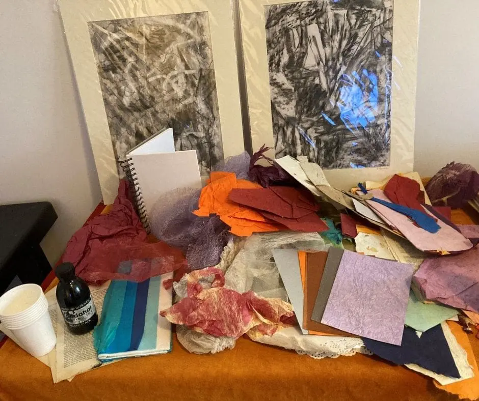 A table with papers and cards on it