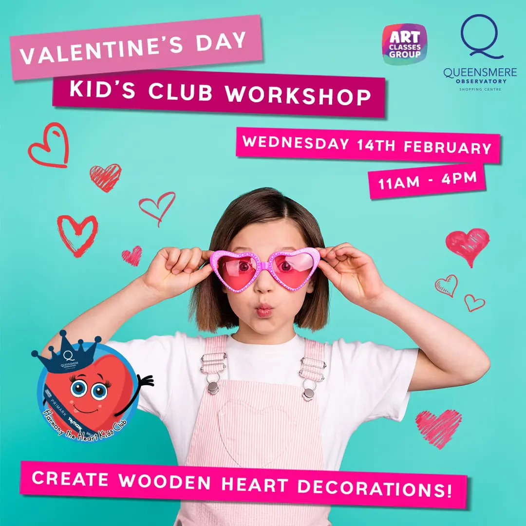 Girl making heart decorations at kid's club.