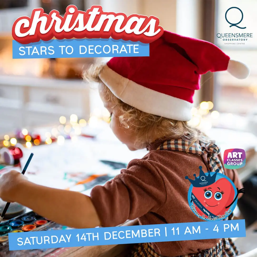Child decorating Christmas stars, Dec 14th.