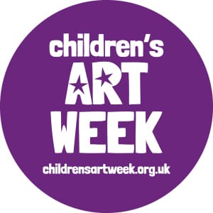 A purple circle with the words children 's art week written in white.
