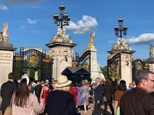 People gathered at the gates of Buckingham Palace.