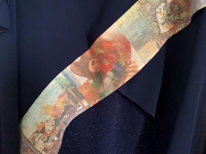 Sleeve tattoo with colorful artwork.