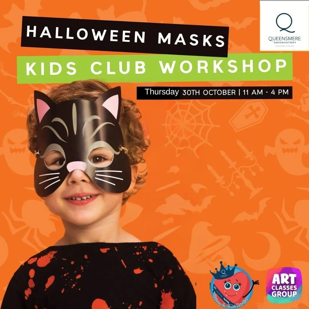 Child wearing a cat mask for a Halloween kids workshop.