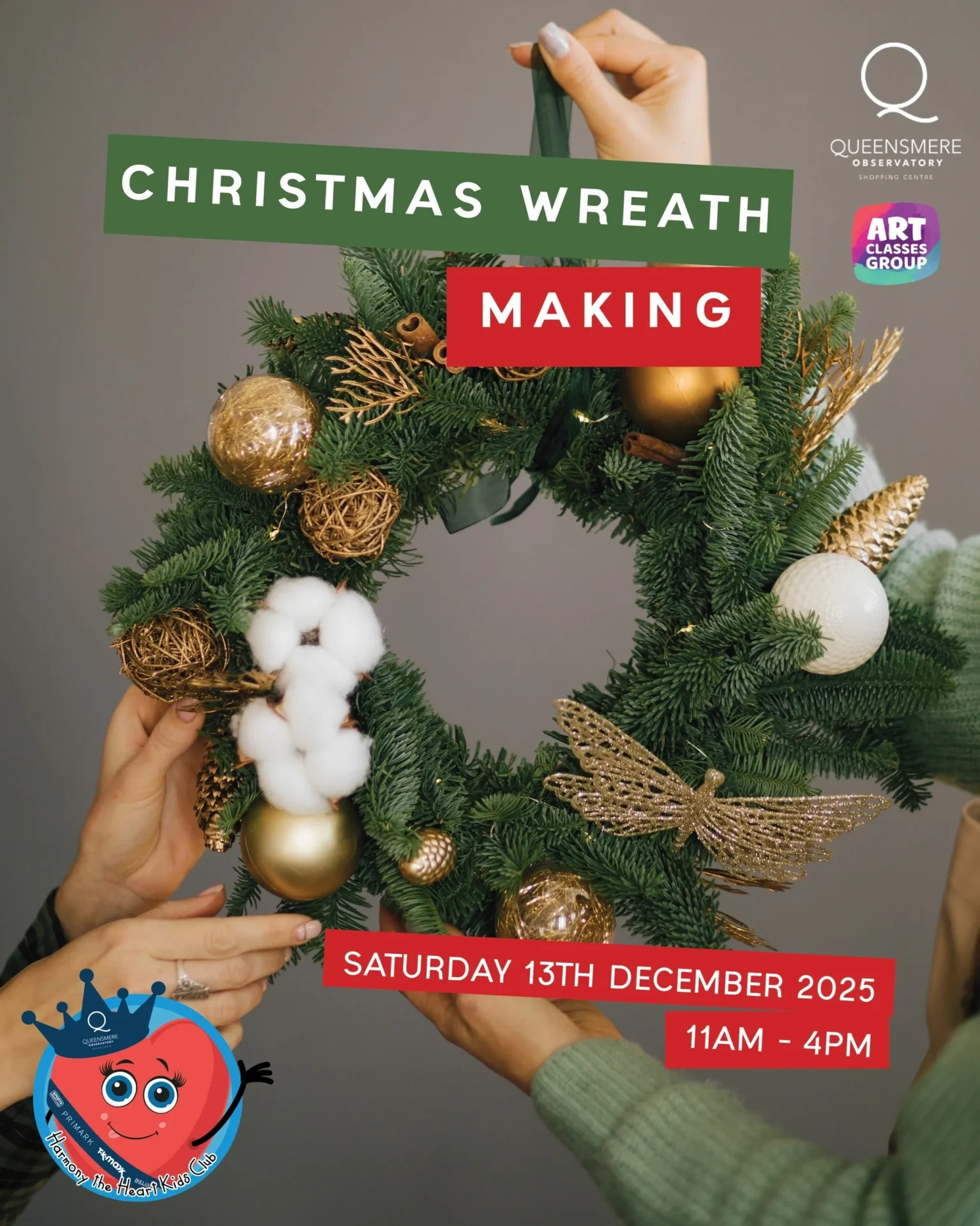 Hands crafting a Christmas wreath adorned with ornaments and cotton.
